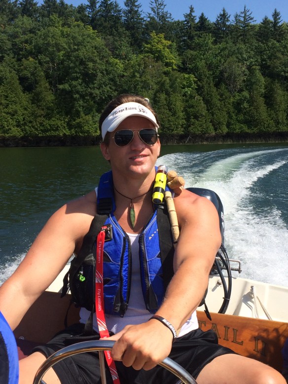Mike Ballard boating on Lake Ann.